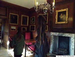 12YR OLD HOLLY McGEE (RIGHT) SHOWS MUM ANGIE & COUSIN BROOK 12, A GHOSTLY FIGURE THAT APPEARED AFTER SHE TOOK A PICTURE DURING A TRIP TO HAMPTON COURT.
